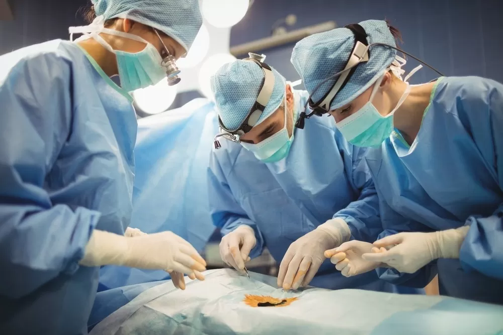 Surgeon working on a patient 