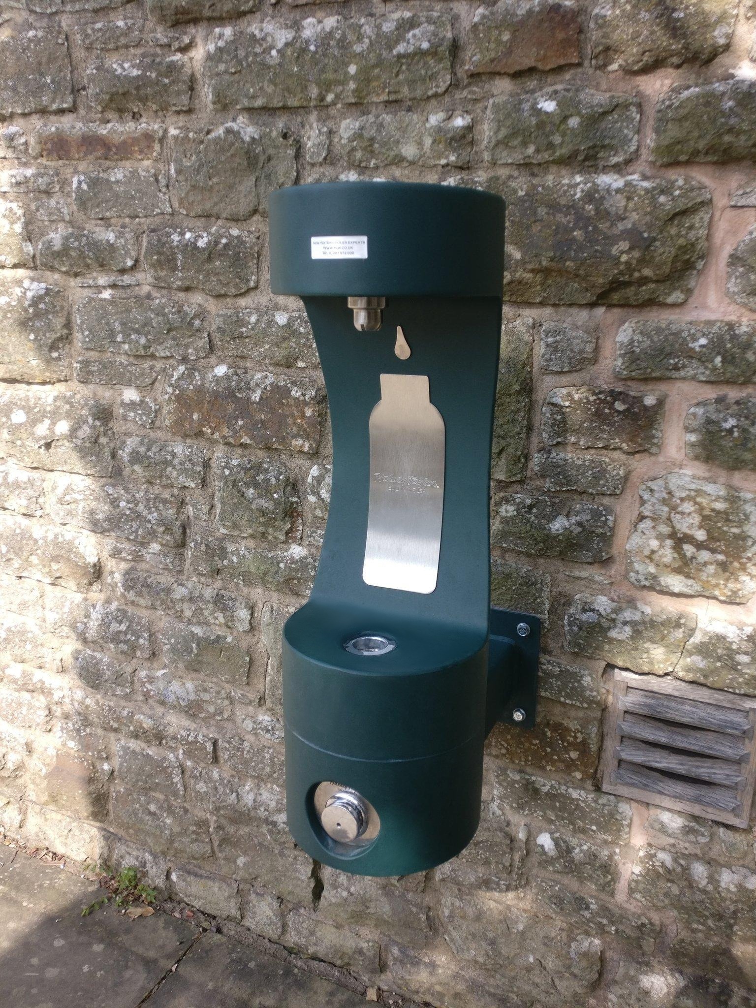 New green outdoor bottle refill station at Tintern Abbey