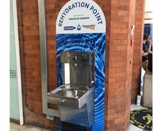 Water bottle refill station in a train station