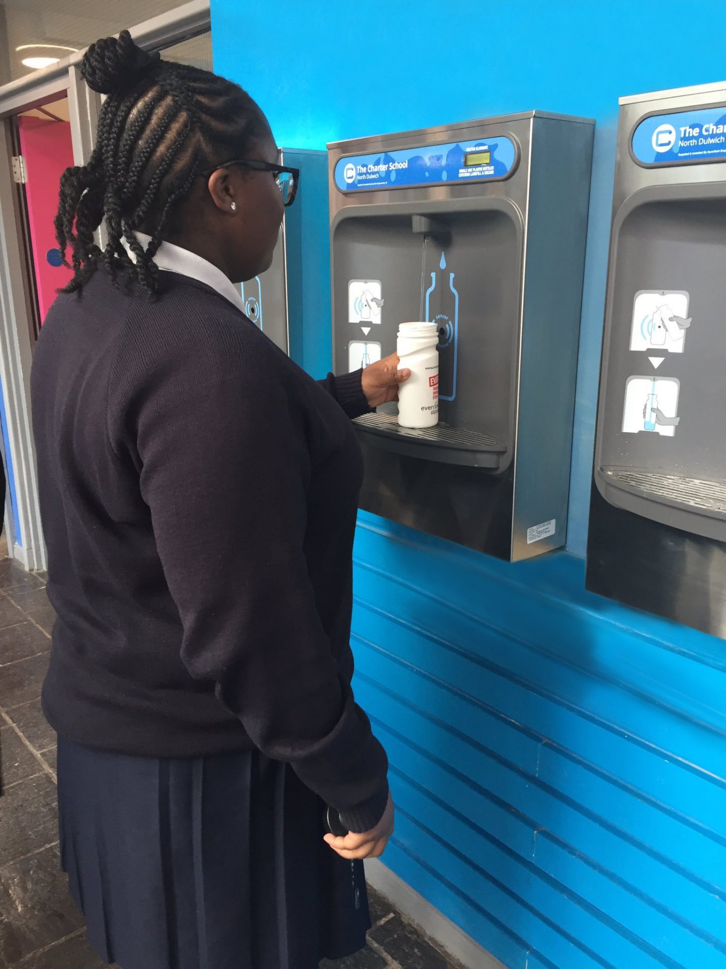 A Student Using Bottle Refill Station At The Charter School North Dulwich