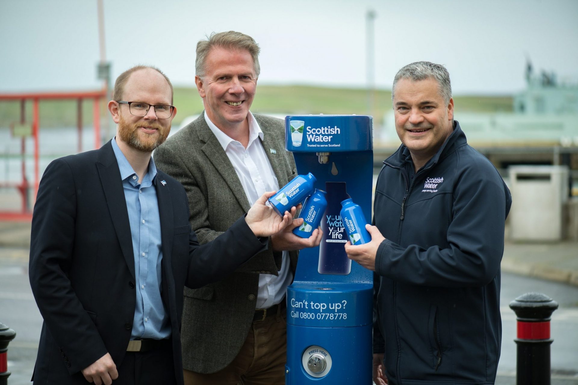 Happy people at the newly installed Scottish Water Bottle Refill Station In Lerwick