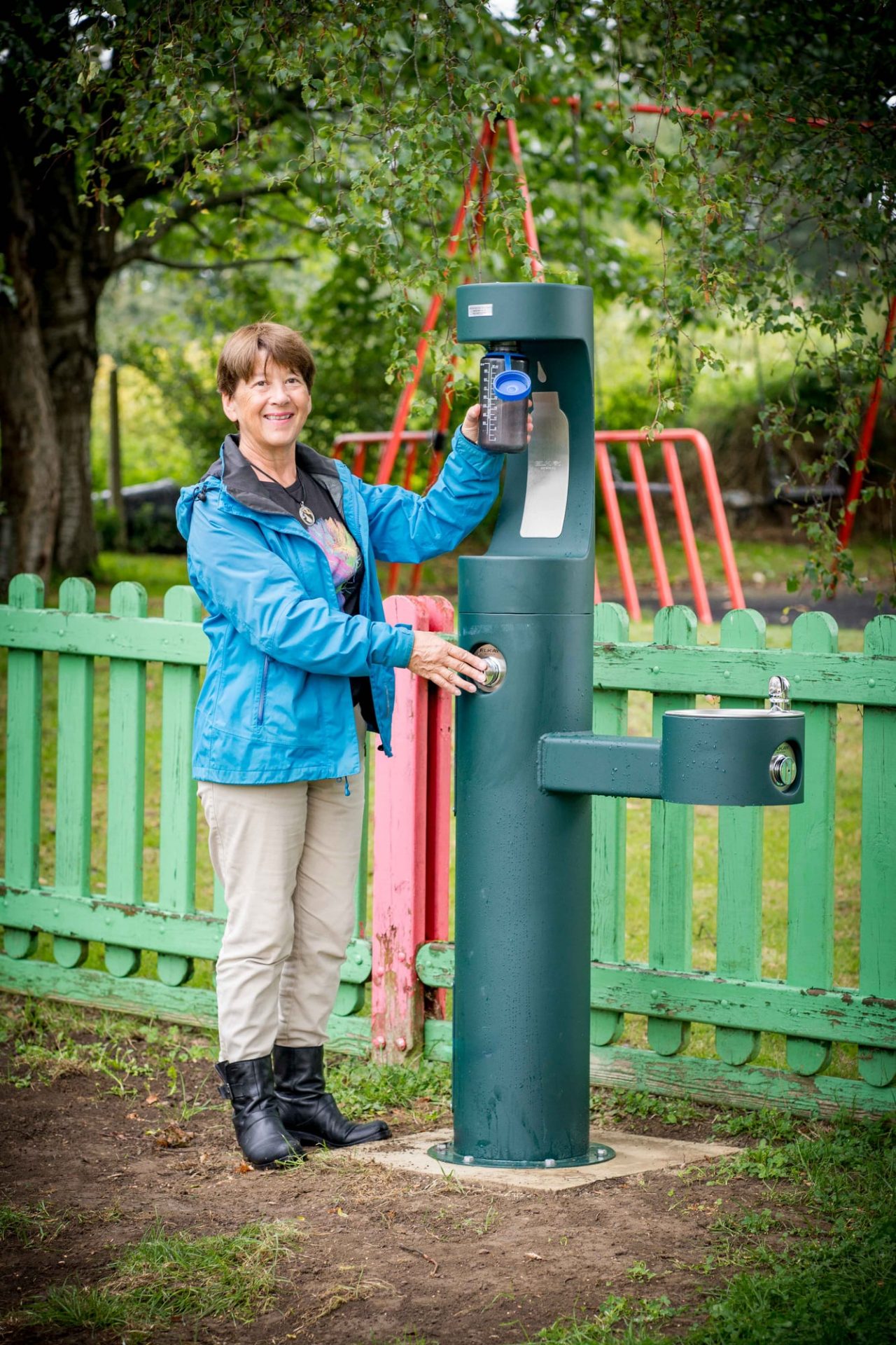 Cllr Alex Kay with the new green bottle refill station at Culver Close Recreation Ground.