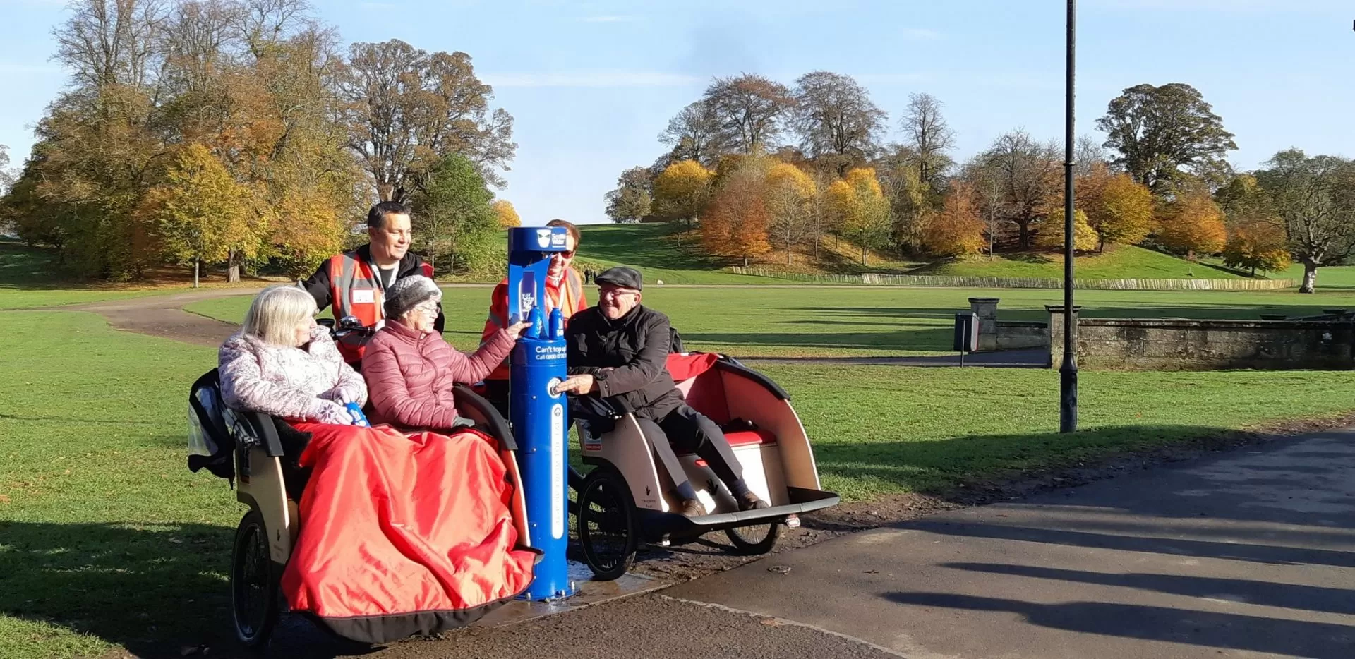Senior residents and regulars at Falkirk Park ready to refill at the new drinking fountain.